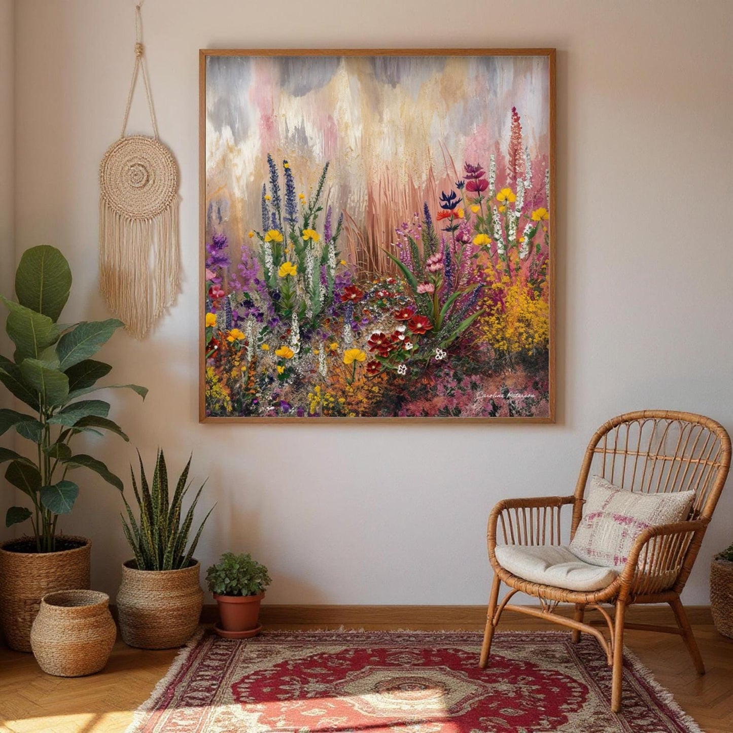 a large, colorful painting of a garden scene hanging on a wall, with a woven chair and potted plants in the foreground.